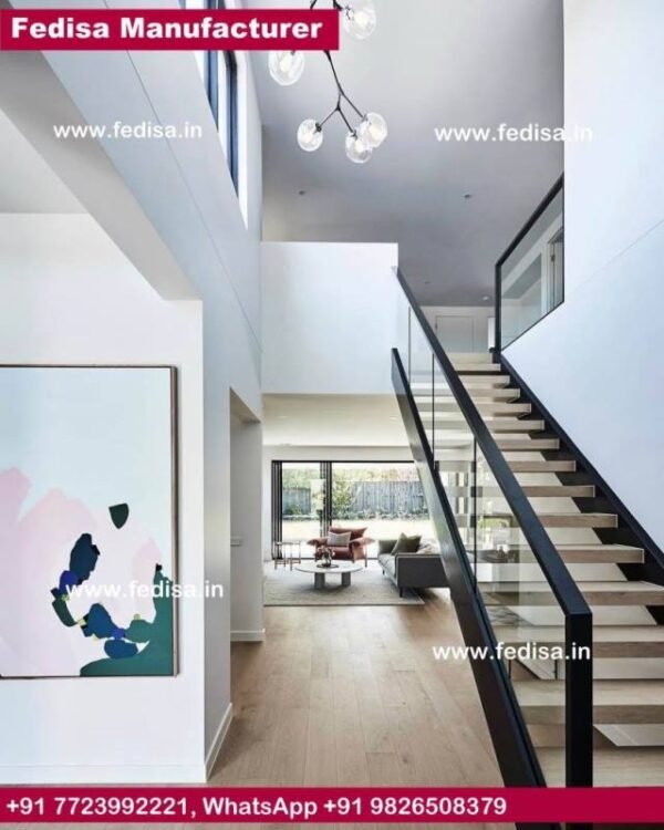 Steel Plate Stair, Round Tapered Wood Balusters | Living room stairs